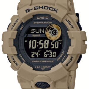 Beige zand kleur digitaal rond Casio horloge.